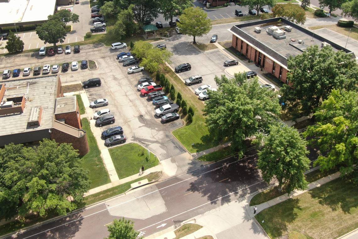 The anti-abortion Advice & Aid Pregnancy Center, right, sits across a parking lot from Planned Parenthood, which provides abortions.