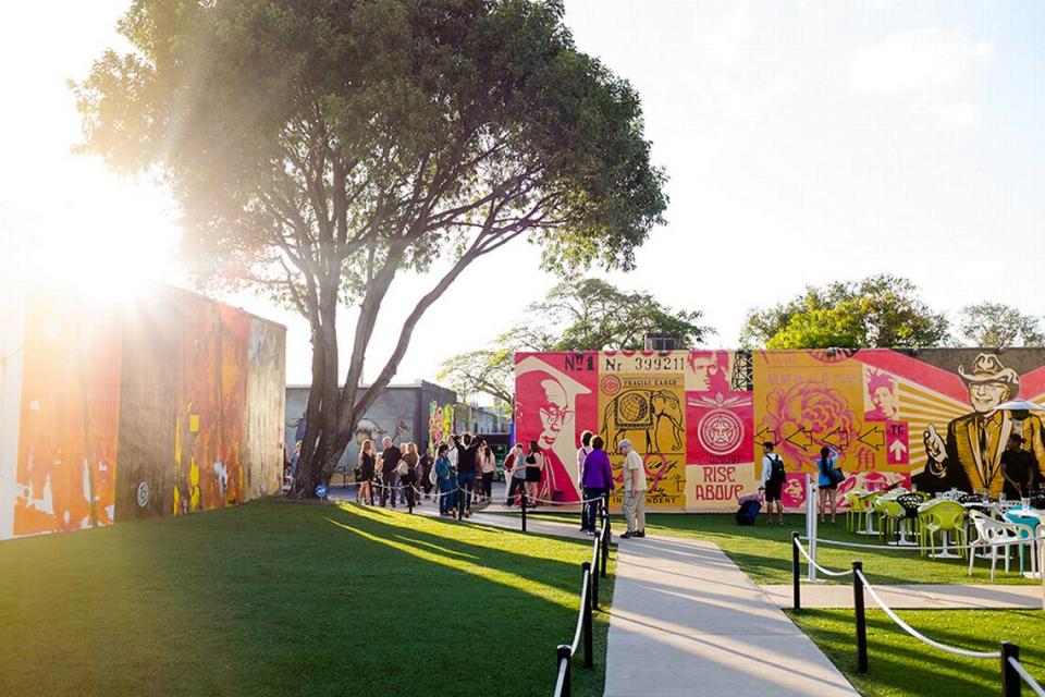 Another view of the Shepard Fairey wall at Wynwood Walls with part of the patio for the former Wynwood Kitchen & Bar at right.