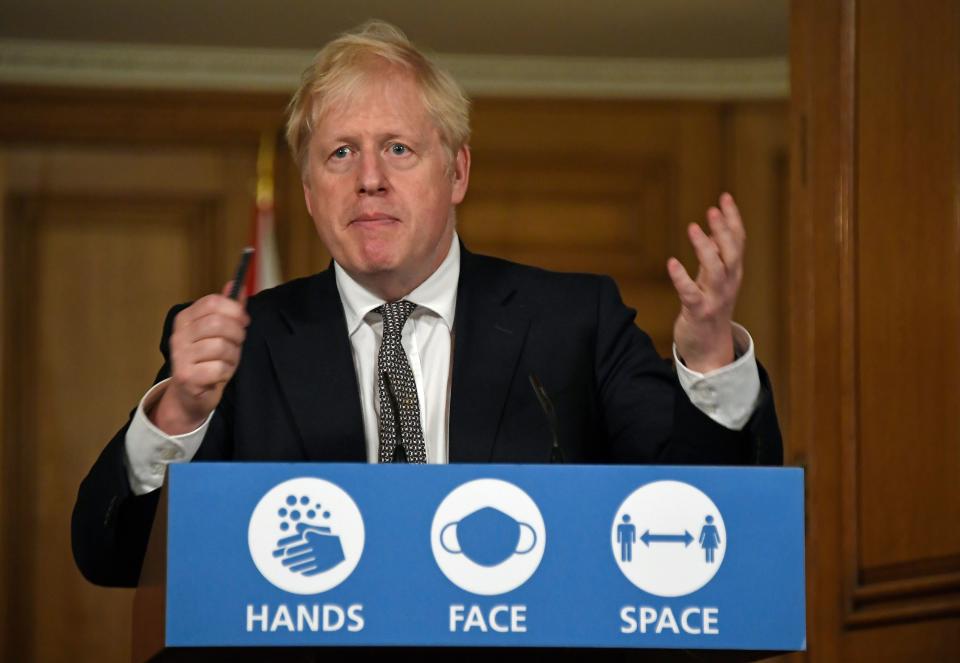 Britain's Prime Minister Boris Johnson speaks during a virtual press conference inside 10 Downing Street in central London on October 31, 2020 to announce new lockdown restrictions in an effort to curb rising infections of the novel coronavirus. - UK Prime Minister Boris Johnson on Saturday announced a new four-week coronavirus lockdown across England, a dramatic strategy shift following warnings hospitals would become overwhelmed under his current system of localised restrictions. (Photo by Alberto Pezzali / POOL / AFP) (Photo by ALBERTO PEZZALI/POOL/AFP via Getty Images)