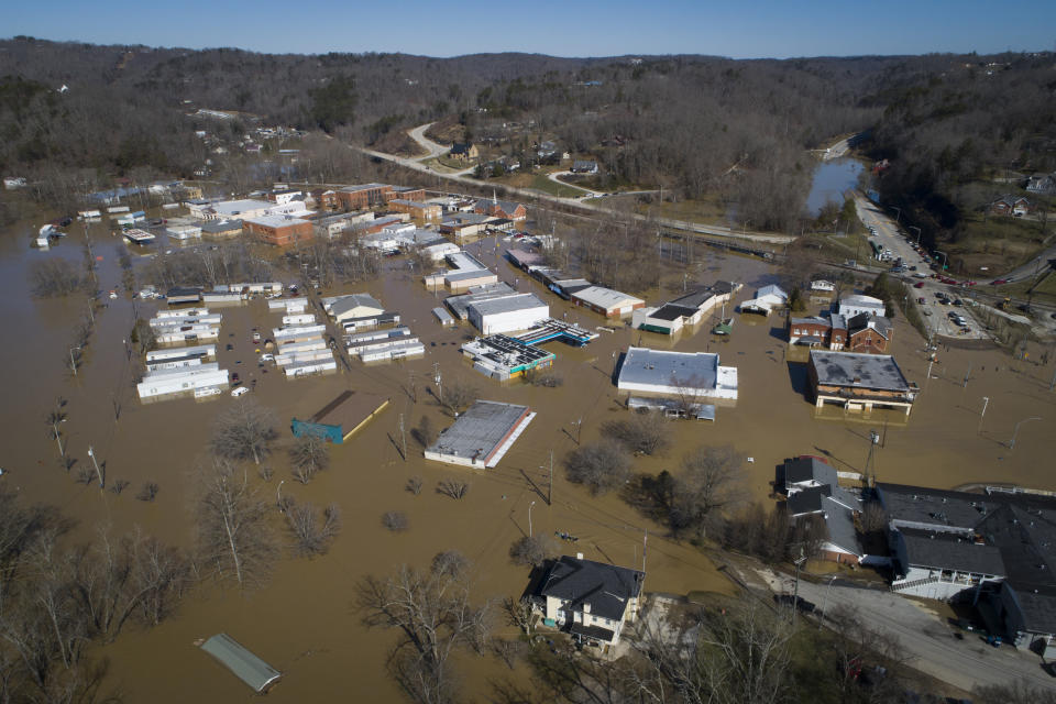 In this photo taken by a drone, the city of Beattyville, Ky., sits underwater following heavy rains which caused the Kentucky River to flood, Tuesday, March 2, 2021. (Alex Slitz/Lexington Herald-Leader via AP)