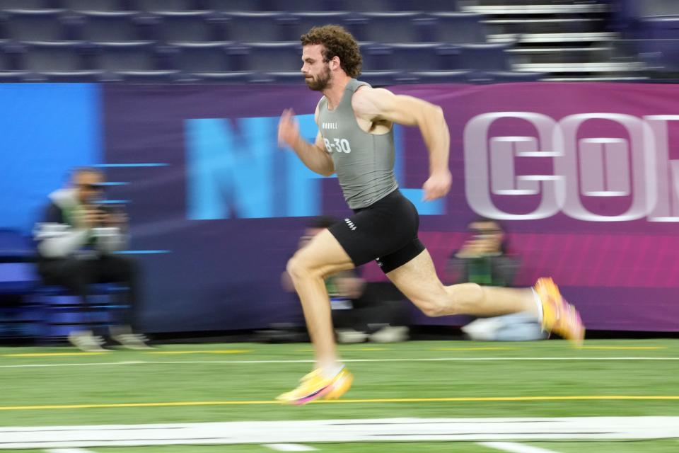 Feb 29, 2024; Indianapolis, IN, USA; North Carolina State linebacker Payton Wilson (LB30) works out during the 2024 NFL Combine at Lucas Oil Stadium. Mandatory Credit: Kirby Lee-USA TODAY Sports