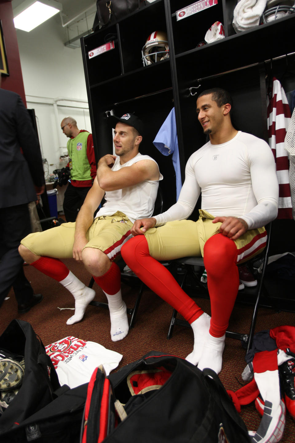 Alex Smith (left) and Colin Kaepernick of the San Francisco 49ers relax in the locker room following the game against the St. Louis Rams at Candlestick Park on Dec. 4, 2011, in San Francisco. 