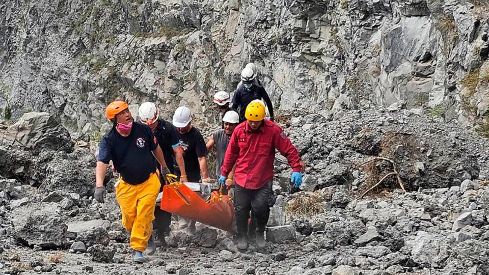 PHOTO: In this photo released by the Hualien Fire Department, firefighters and quarry workers evacuate a body from the Ho Ren Quarry a day after a powerful earthquake struck in Hualien County, eastern Taiwan, Thursday, April 4, 2024.  (AP)