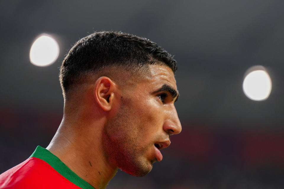 FILE - Morocco's Achraf Hakimi reacts during the World Cup third-place playoff soccer match between Croatia and Morocco at Khalifa International Stadium in Doha, Qatar, Saturday, Dec. 17, 2022. French prosecutors said Friday that Paris Saint-Germain defender and Morocco international star Achraf Hakimi has been indicted on rape charges. (AP Photo/Hassan Ammar, File)