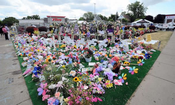 PHOTO: A makeshift memorial filled with flowers, photos and mementos outside the Tops Friendly Market, July 14, 2022, in Buffalo, N.Y. (John Normile/Getty Images)