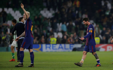 Soccer Football - La Liga Santander - Real Betis vs FC Barcelona - Estadio Benito Villamarin, Seville, Spain - January 21, 2018 Barcelona’s Ivan Rakitic and Lionel Messi celebrate after the match REUTERS/Jon Nazca