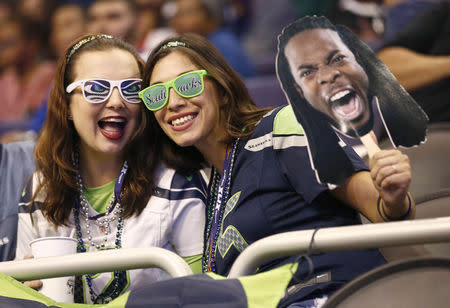 Jan 27, 2015; Phoenix, AZ, USA; Seattle Seahawks fans Meredith Grissom from Orlando, Florida and Allie Pfeiffer of Stockton, California during media day for Super Bowl XLIX at US Airways Center. Mandatory Credit: Rob Schumacher-Arizona Republic via USA TODAY Sports