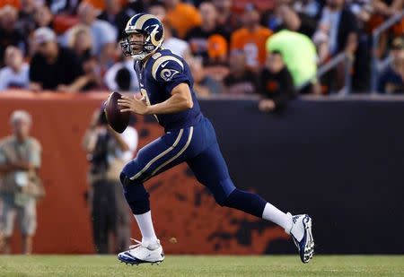 St. Louis Rams quarterback Sam Bradford (8) moves to pass the ball in the first quarter against the Cleveland Browns at FirstEnergy Stadium. Mandatory Credit: Rick Osentoski-USA TODAY Sports