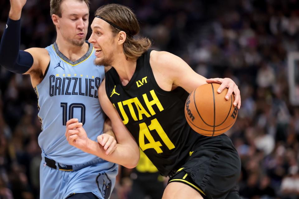 Utah Jazz forward <a class="link " href="https://sports.yahoo.com/nba/players/5164" data-i13n="sec:content-canvas;subsec:anchor_text;elm:context_link" data-ylk="slk:Kelly Olynyk;sec:content-canvas;subsec:anchor_text;elm:context_link;itc:0">Kelly Olynyk</a> (41) drives against Memphis Grizzlies guard <a class="link " href="https://sports.yahoo.com/nba/players/5825" data-i13n="sec:content-canvas;subsec:anchor_text;elm:context_link" data-ylk="slk:Luke Kennard;sec:content-canvas;subsec:anchor_text;elm:context_link;itc:0">Luke Kennard</a> (10) during the game at the Delta Center in Salt Lake City on Wednesday, Nov. 1, 2023. | Spenser Heaps, Deseret News