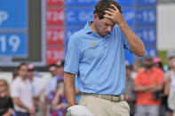 Ben Kohles reactsafter missing a putt on the 18th hole during the final round of the Byron Nelson golf tournament in McKinney, Texas, Sunday, May 5, 2024. (AP Photo/LM Otero)