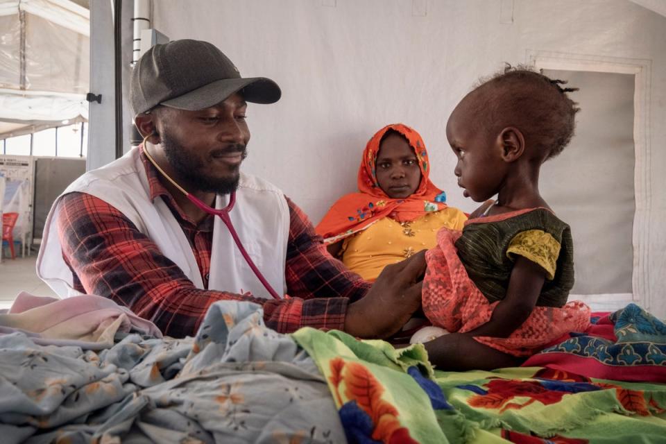 A Sudanese child is checked in an MSF clinic in Chad (AP)