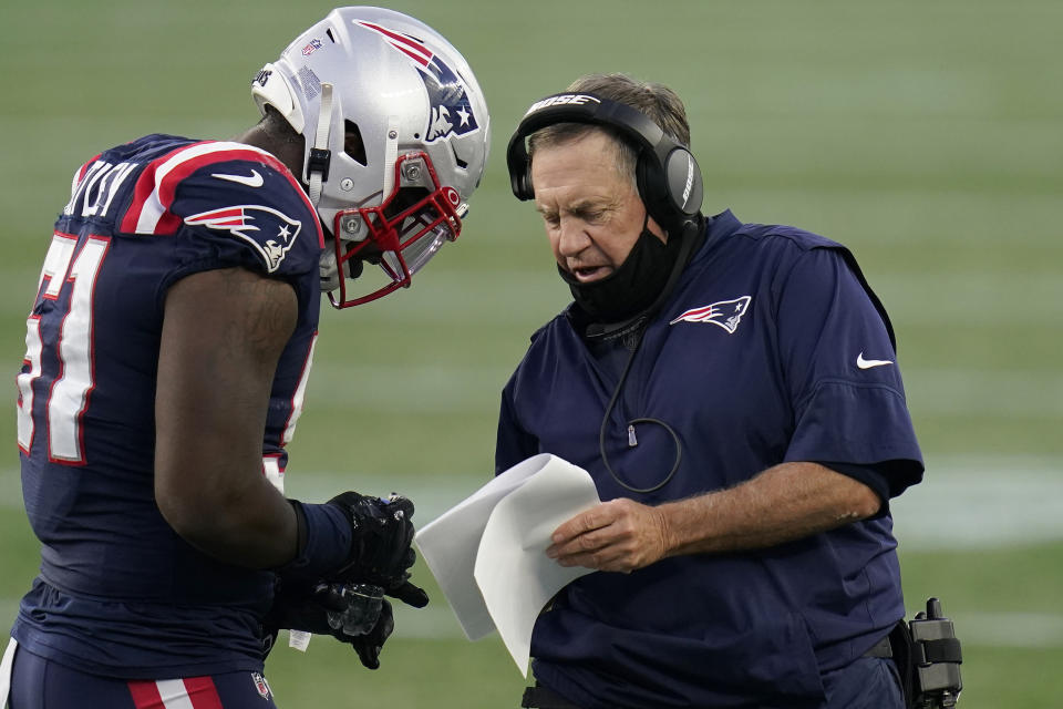 New England Patriots head coach Bill Belichick, right, gives instructions to linebacker Ja'Whaun Bentley (51) in the first half of an NFL football game against the San Francisco 49ers, Sunday, Oct. 25, 2020, in Foxborough, Mass. (AP Photo/Charles Krupa)