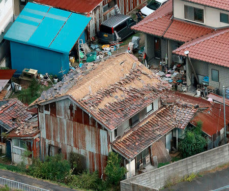 Houses damaged by an earthquake are seen in Kurayoshi, Tottori prefecture, Japan, October 21, 2016 in this photo released by Kyodo. Mandatory credit Kyodo/via REUTERS