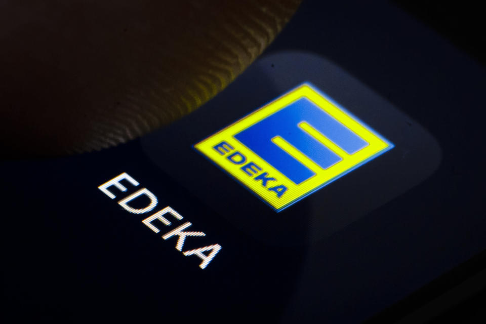 Berlin, Germany - February 07: In this photo illustration the logo of German supermarket chain EDEKA is displayed on a smartphone on February 07, 2019 in Berlin, Germany. (Photo Illustration by Thomas Trutschel/Photothek via Getty Images)