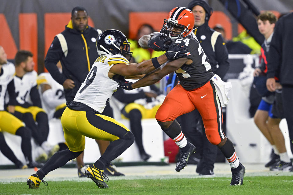 Cleveland Browns running back Nick Chubb (24) gets past Pittsburgh Steelers safety Minkah Fitzpatrick (39) during the first half of an NFL football game in Cleveland, Thursday, Sept. 22, 2022. (AP Photo/David Richard)