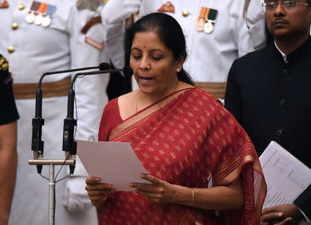 India's ruling Bharatiya Janata Party (BJP) politician and member of parliament Nirmala Sitharaman takes the oath during the swearing-in ceremony of new ministers at the Presidential Palace in New Delhi, India, September 3, 2017. REUTERS/ Prakash Singh/Pool