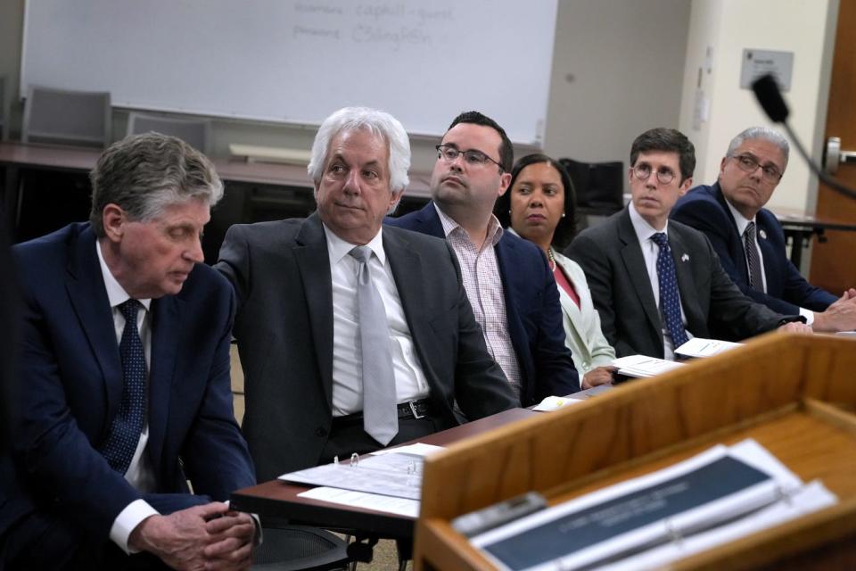 Left to right RI Governor Dan McKee, Peter Alviti, Jr (Dir. RI Dept of Transportation), Derek Torrey (FHWA RI Div. Administrator), Lt Governor Sabina Matos, Providence Mayor Brett Smiley and East Providence Mayor Bob Silva as they listen to an engineer's explanation of the structural failure of the Washington Bridge during an afternoon press conference at the Department of Administration building on March 14, 2024.