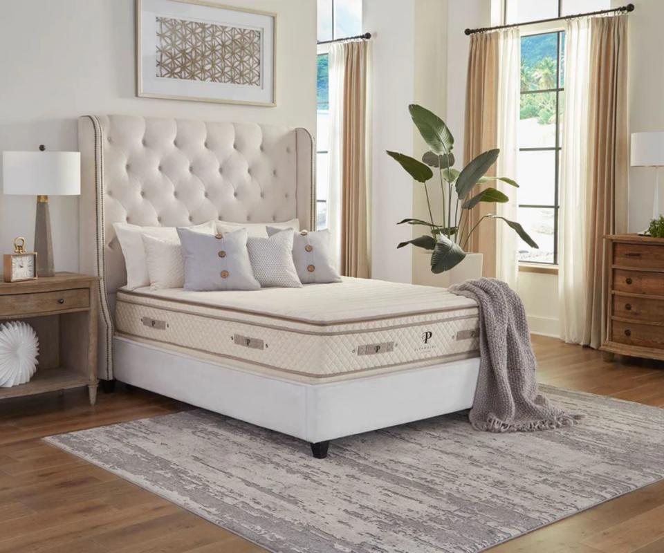 A PlushBeds Botanical Bliss Mattress in a traditional bedroom