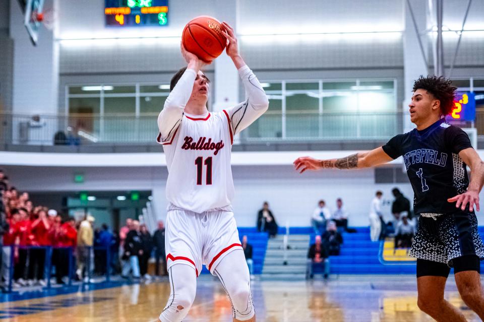 Old Rochester's John Butler hits the mid-range jumper.