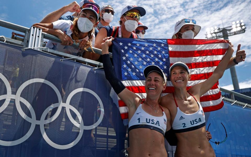 April Ross of the United States and Alix Klineman of the United States celebrate winning gold medal match against Australia. - REUTERS/John Sibley