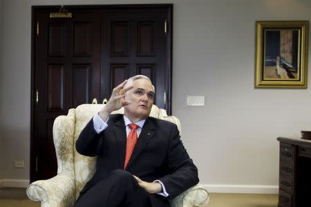 Panama Canal Administrator Jorge Quijano gestures as he speaks during an interview with Reuters in Panama City March 24, 2015. REUTERS/Carlos Jasso