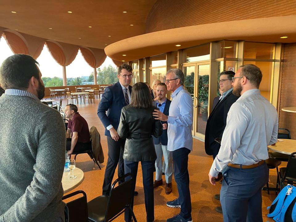 Conservative personality Charlie Kirk, founder of Turning Point USA, mingles with guests before a speech at Gammage Auditorium on Feb. 8, 2023.