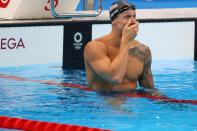 <p>Team USA's Caleb Dressel is in shock as he wins gold in the Men's 100 meter freestyle final at Tokyo Aquatics Centre on July 29.</p>