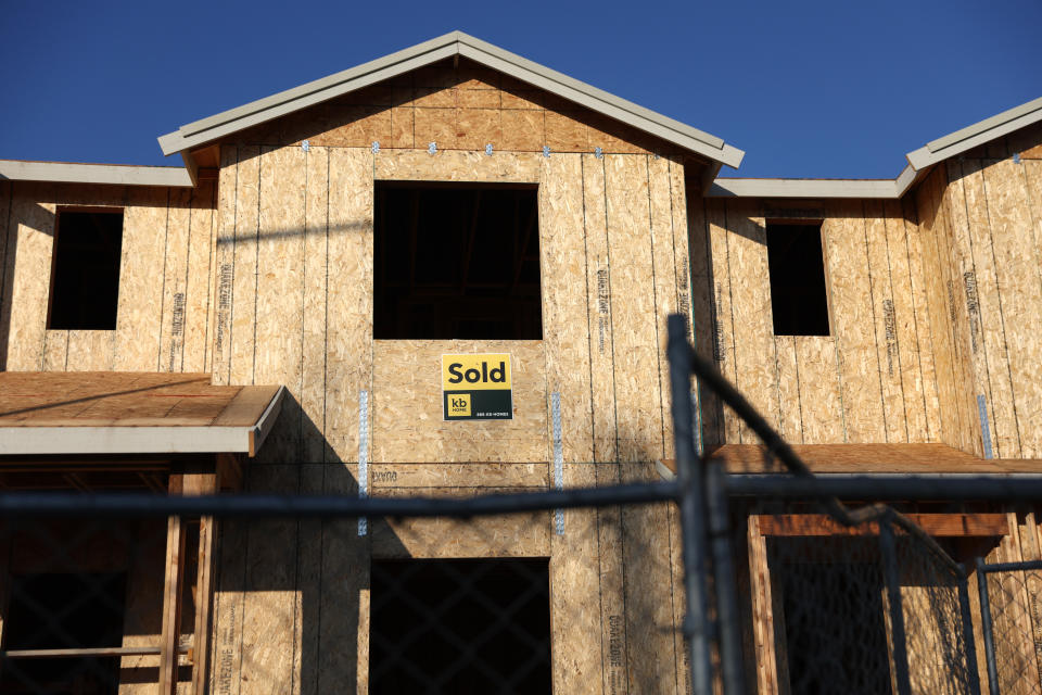 Sold signs are posted in front of homes under construction at a KB Home housing development on January 12, 2022 in Novato, California. (Photo by Justin Sullivan/Getty Images)