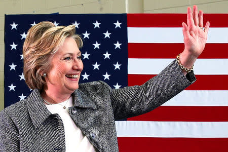 U.S. Democratic presidential candidate Hillary Clinton waves after leading a discussion on gun violence prevention at the Wilson-Gray YMCA in Hartford, Connecticut, U.S., April 21, 2016. REUTERS/Adrees Latif