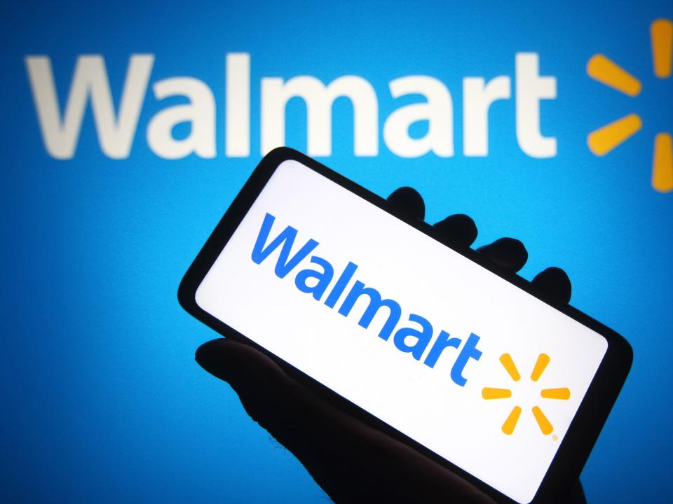 illustration of Walmart sign with a smartphone