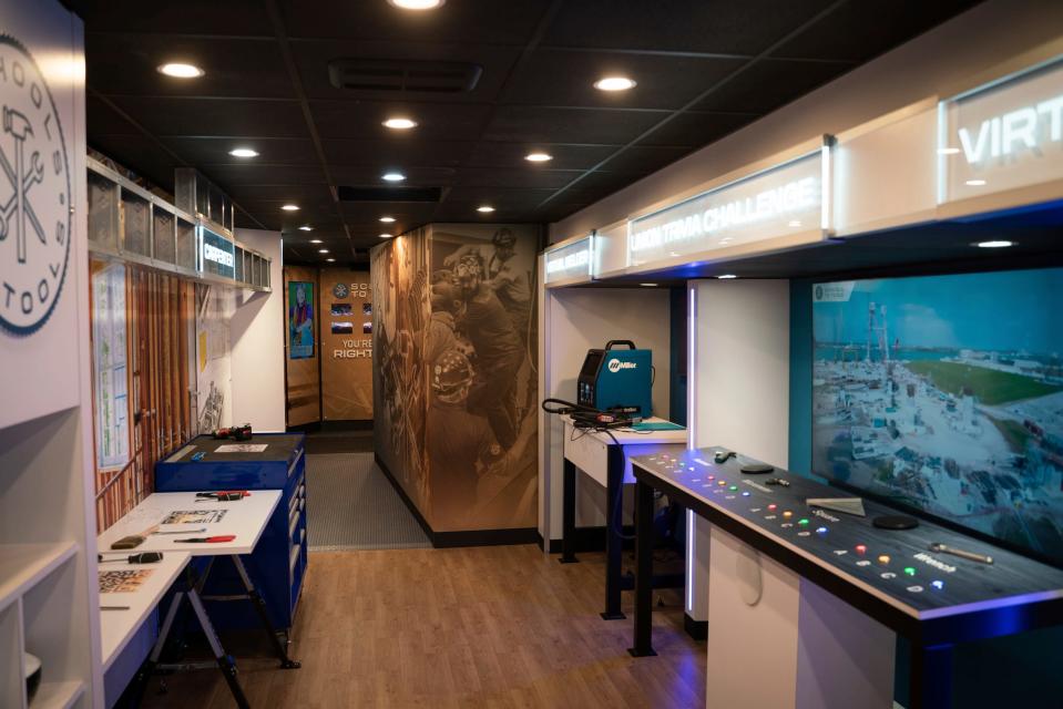 An interactive exhibit on wheels commissioned by the Michigan Regional Council of Carpenters and Millwrights to spread the word about skilled trades is designed at Creative Solutions Group in Clawson on Thursday, Aug. 31, 2023.
