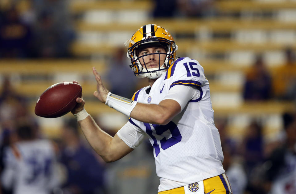 LSU quarterback Myles Brennan (15) warms up before an NCAA college football game against Texas A&M in Baton Rouge, La., Saturday, Nov. 25, 2017. (AP Photo/Gerald Herbert)