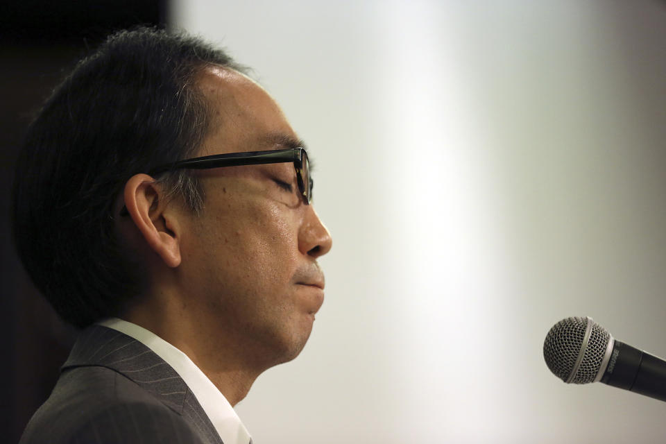 Takashi Niigaki, ghost writer of well known deaf composer Mamoru Samuragochi, a composer Japanese have likened to Beethoven for supposedly composing music despite a severe hearing impairment, reacts to a reporter's question during a press conference in Tokyo, Thursday, Feb. 6, 2014. Niigaki said he hopes to continue composing and performing, despite the uproar over Samuragochi’s admission on Wednesday that he did not write the pieces he is best known for, such as his “Hiroshima Symphony.” (AP Photo/Eugene Hoshiko)