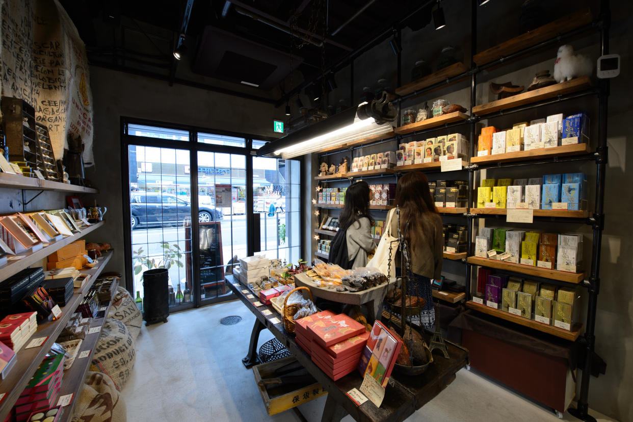 Customers look at chocolate bars at Cacao Store, a specialist chocolate store, in Tokyo, Japan, on Tuesday, May 10, 2016. Photographer Akio Kon/Bloomberg Photographer: Akio Kon