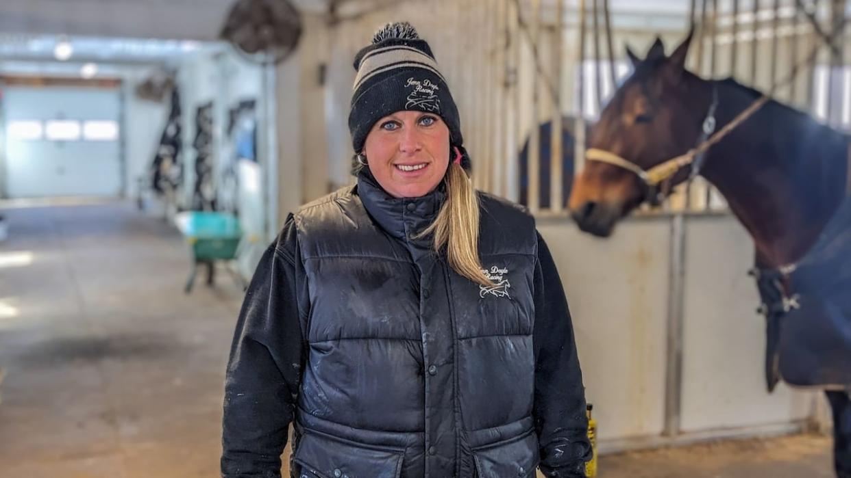 Jenn Doyle finished with 74 wins at Red Shores Charlottetown in 2023, ahead of Jason Hughes who was second with 69 wins.  (Shane Hennessey/CBC - image credit)