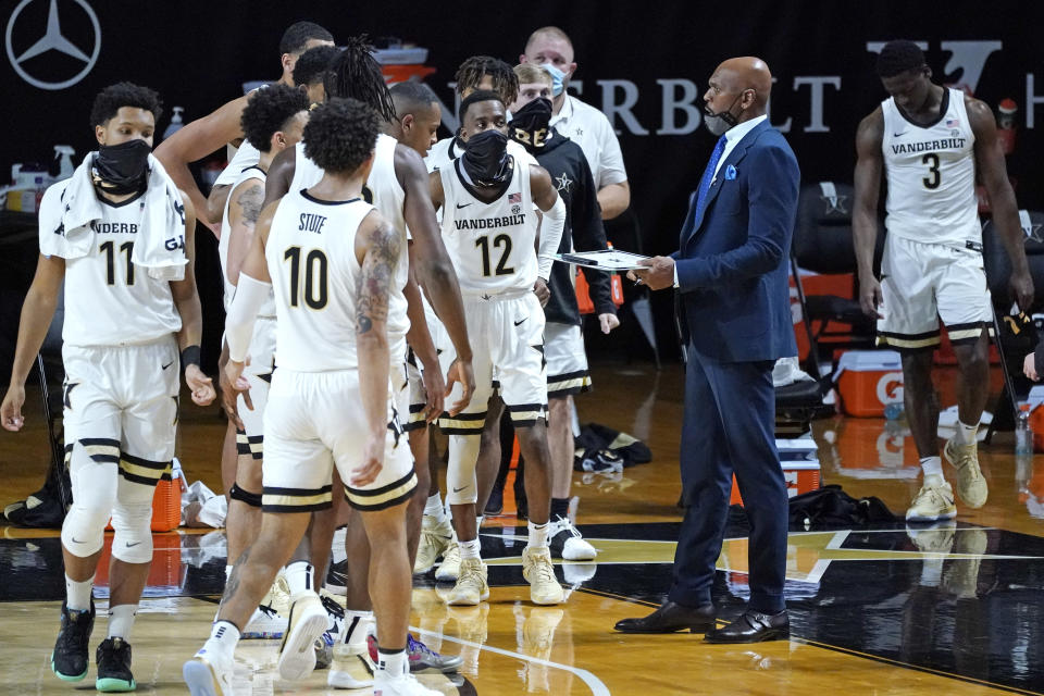 Vanderbilt head coach Jerry Stackhouse talks with his players during a time out in the first half of an NCAA college basketball game against Valparaiso Friday, Nov. 27, 2020, in Nashville, Tenn. (AP Photo/Mark Humphrey)