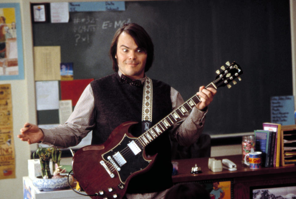 Jack Black playing guitar.