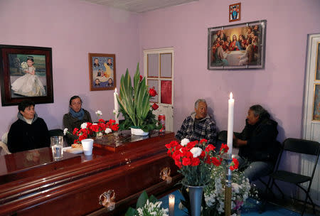 Relatives hold a wake for Cesar Jimenez Brito, 40, who died during the explosion of a fuel pipeline ruptured by suspected oil thieves, at his house in the municipality of Tlahuelilpan, state of Hidalgo, Mexico January 20, 2019. REUTERS/Henry Romero