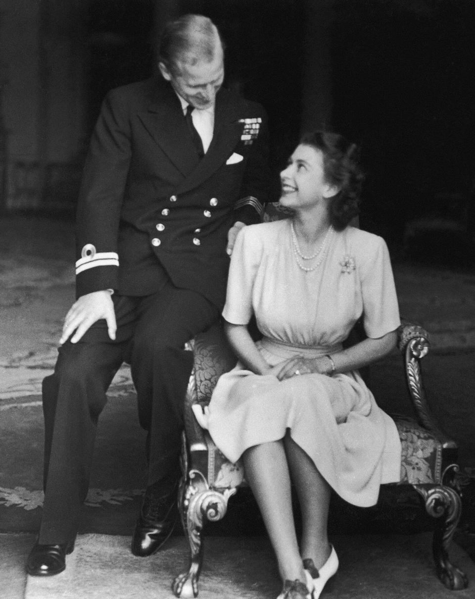 Princess Elizabeth (later Queen Elizabeth II) and her fiance, Philip Mountbatten at Buckingham Palace, after their engagement was announced, 10th July 1947