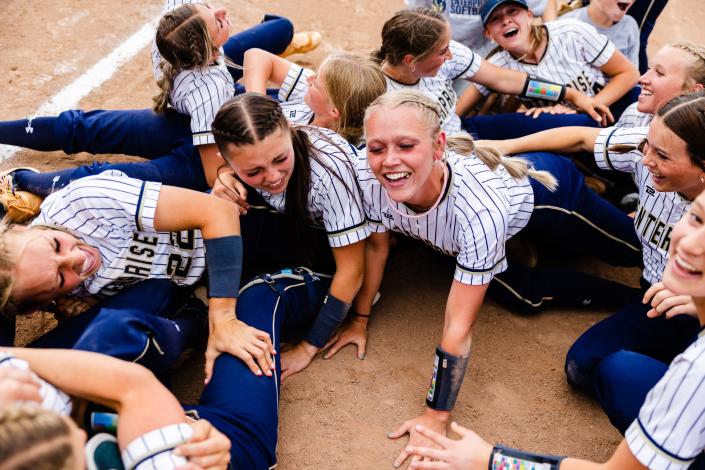 Enterprise celebrates after winning the 2A girls softball finals at Spanish Fork Sports Park in Spanish Fork on May 13, 2023. | Ryan Sun, Deseret News