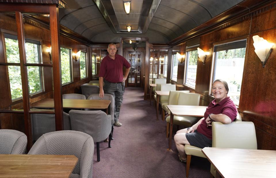 Simon and Diana Parums inside their full-size steam train in Keswick (Owen Humphreys/PA) (PA Wire)