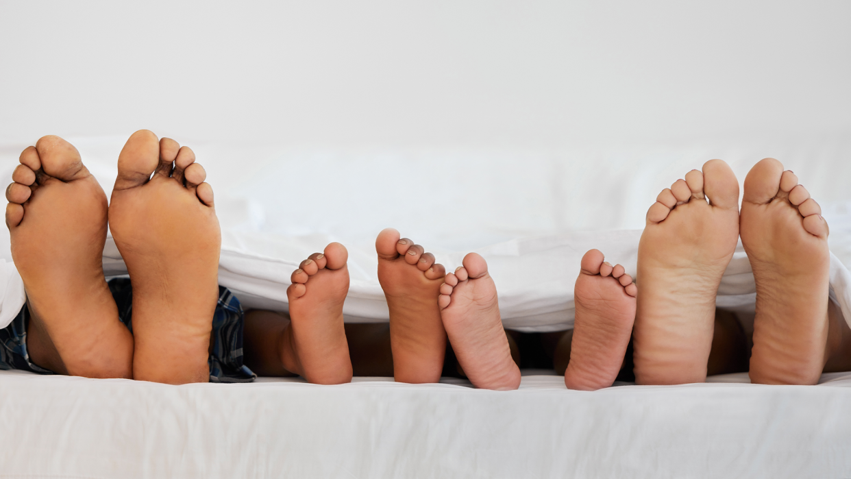 Some parents have found that co-sleeping with their kid works for them. But what happens when a new partner or stepparent enters the picture? (Photo: Getty Images)