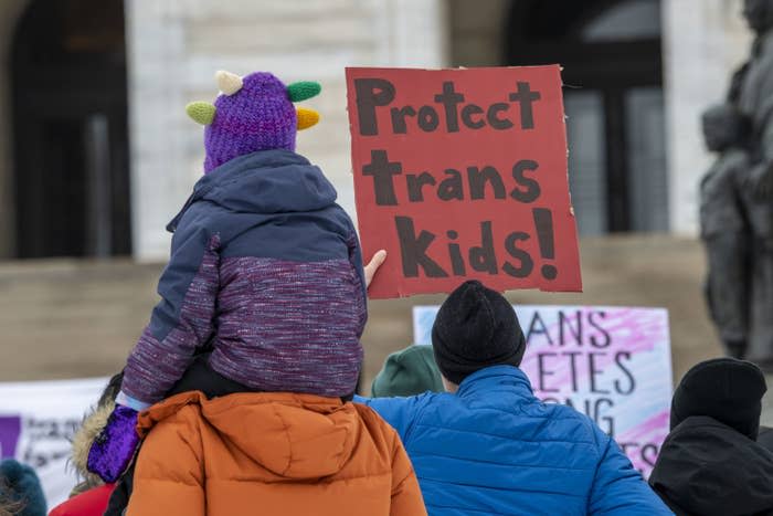 A sign saying, "Protect trans kids!"