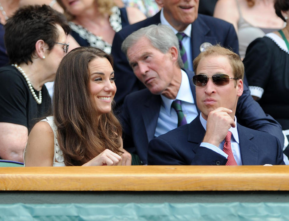 <p>A few years later, the Duke and Duchess of Cambridge are photographed in the Royal Box on centre court. The pair had only been married a couple of months at this point. (PA)</p> 