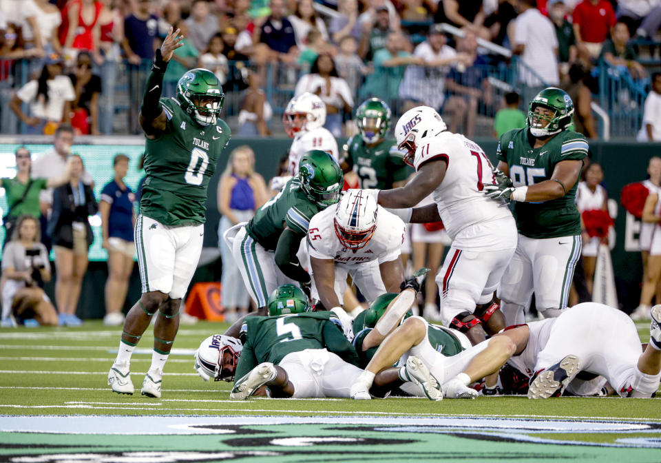 Tulane defensive lineman Patrick Jenkins (0) celebrates after a sack against South Alabama during the first quarter of an NCAA college football game in New Orleans, Saturday, Sept. 2, 2023. (AP Photo/Derick Hingle)