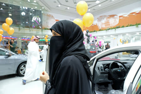 A Saudi woman is seen at the first automotive showroom solely dedicated for women in Jeddah, Saudi Arabia January 11, 2018. REUTERS/Reem Baeshen