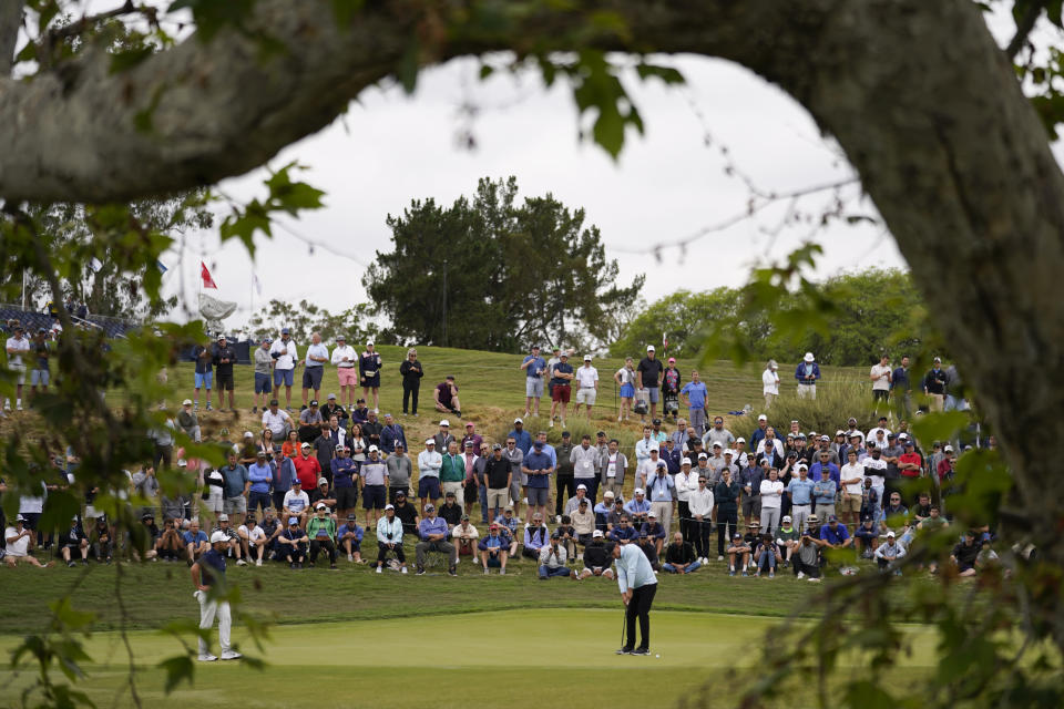 Bryson DeChambeau putts on the third hole during the first round of the U.S. Open golf tournament at Los Angeles Country Club on Thursday, June 15, 2023, in Los Angeles. (AP Photo/George Walker IV)