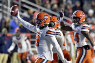Syracuse linebacker Anwar Sparrow celebrates after recovering a fumble by Boston College quarterback Emmett Morehead during the first half of an NCAA college football game Saturday, Nov. 26, 2022, in Boston. (AP Photo/Mark Stockwell)