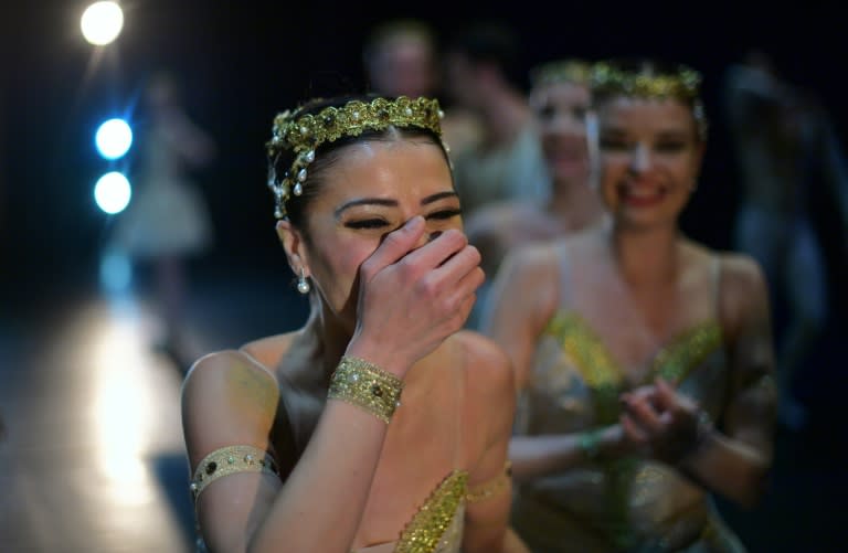 Ballet dancers react after performing on the opening night of a ballet production at the Municipal Theater in Rio de Janeiro, Brazil June 23, 2018