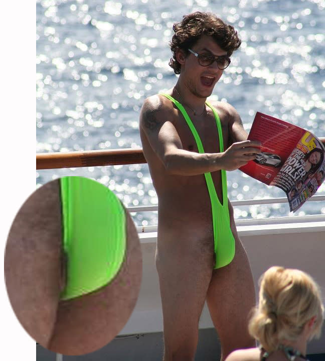 Dear John Mayer, nothing says  "I'm cool and not desperate for media attention" like wearing a fluorescent, thonged, suspendered Speedo and holding a copy of Us Weekly.